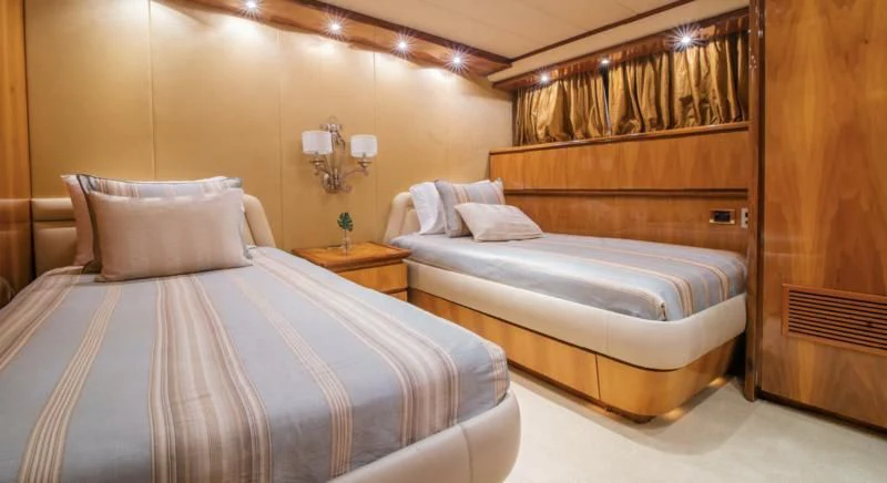 a couple of beds in a hotel room aboard SHALIMAR Yacht for Sale