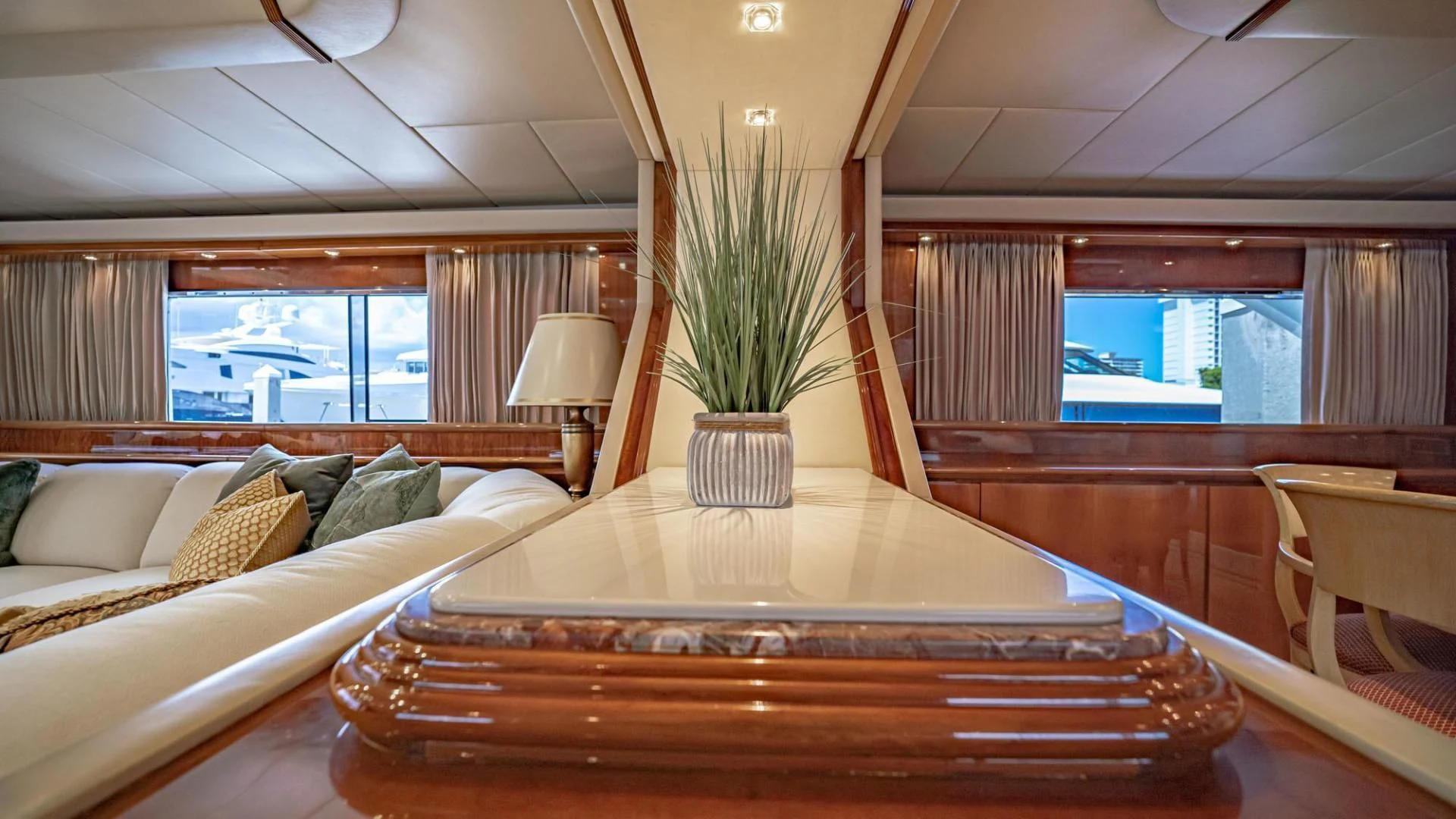 a living room with a large table aboard SHALIMAR Yacht for Sale