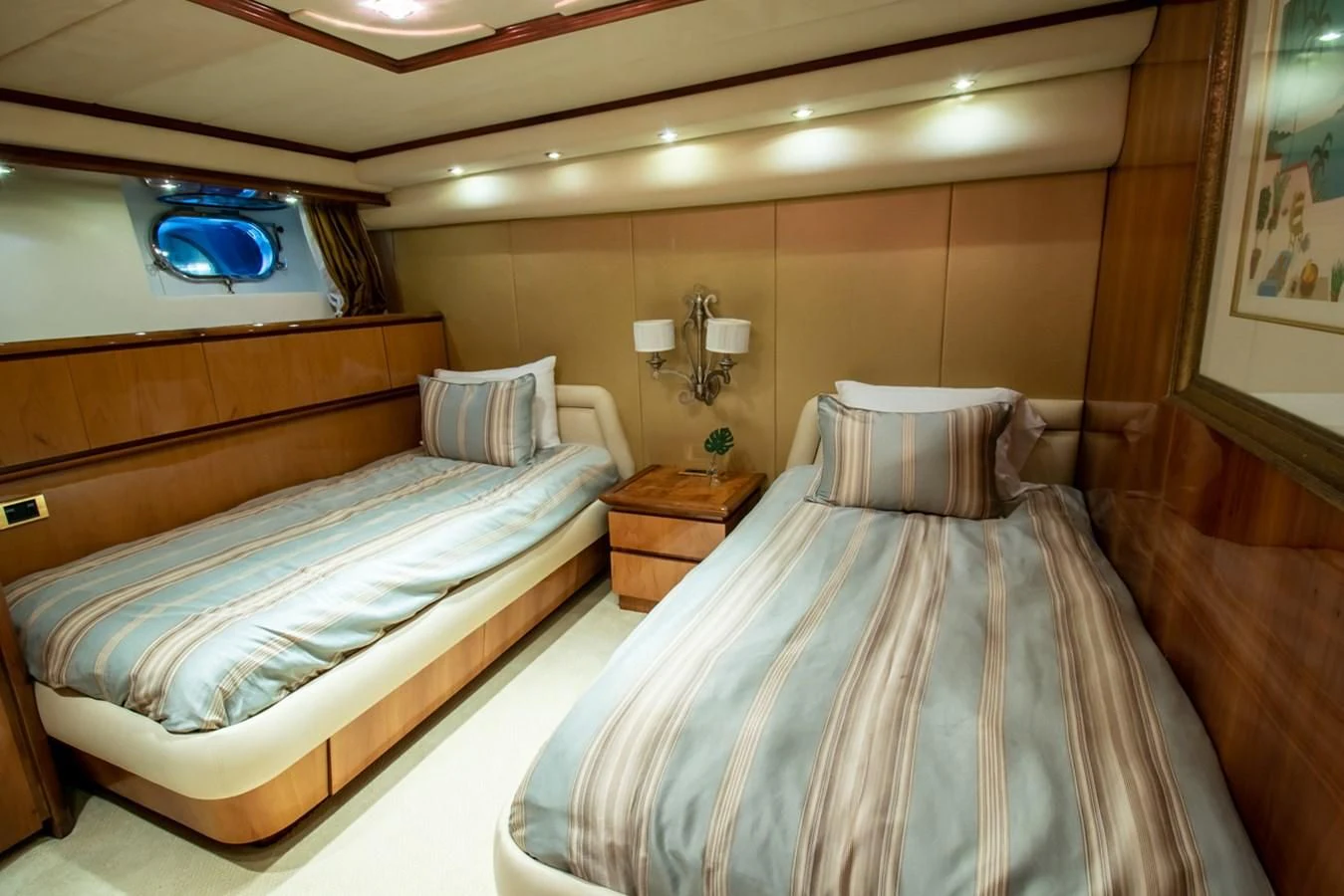 a couple of beds in a hotel room aboard SHALIMAR Yacht for Sale
