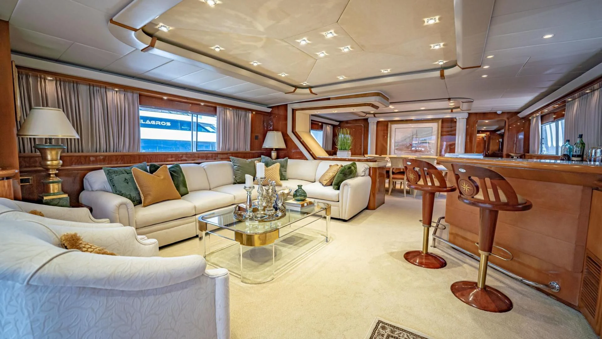 a living room with a large window aboard SHALIMAR Yacht for Sale