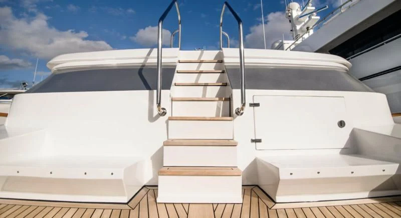 a white boat with a ladder aboard SHALIMAR Yacht for Sale