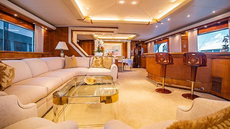a living room with a large mirror aboard SHALIMAR Yacht for Sale