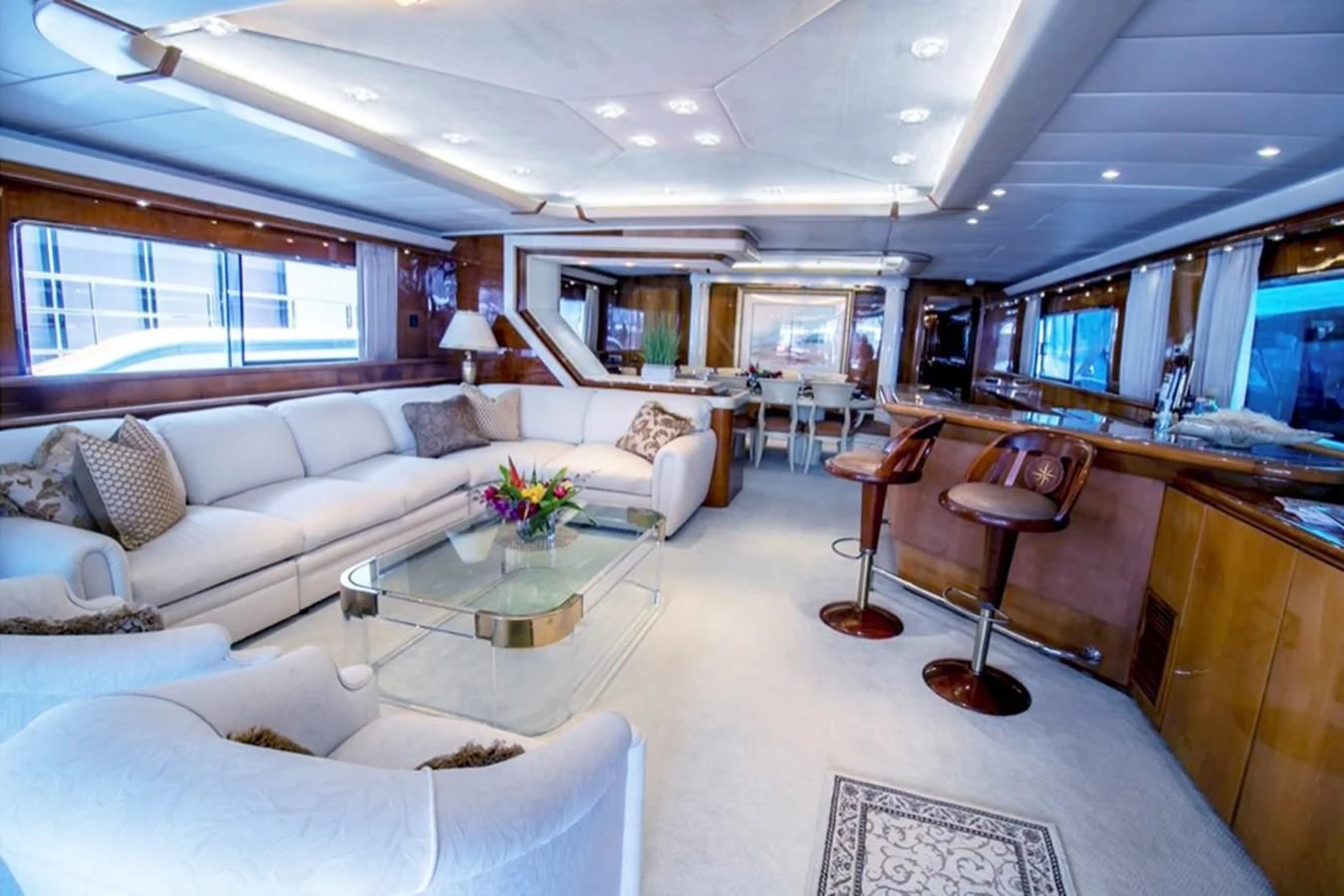 a living room with a large window aboard SHALIMAR Yacht for Sale