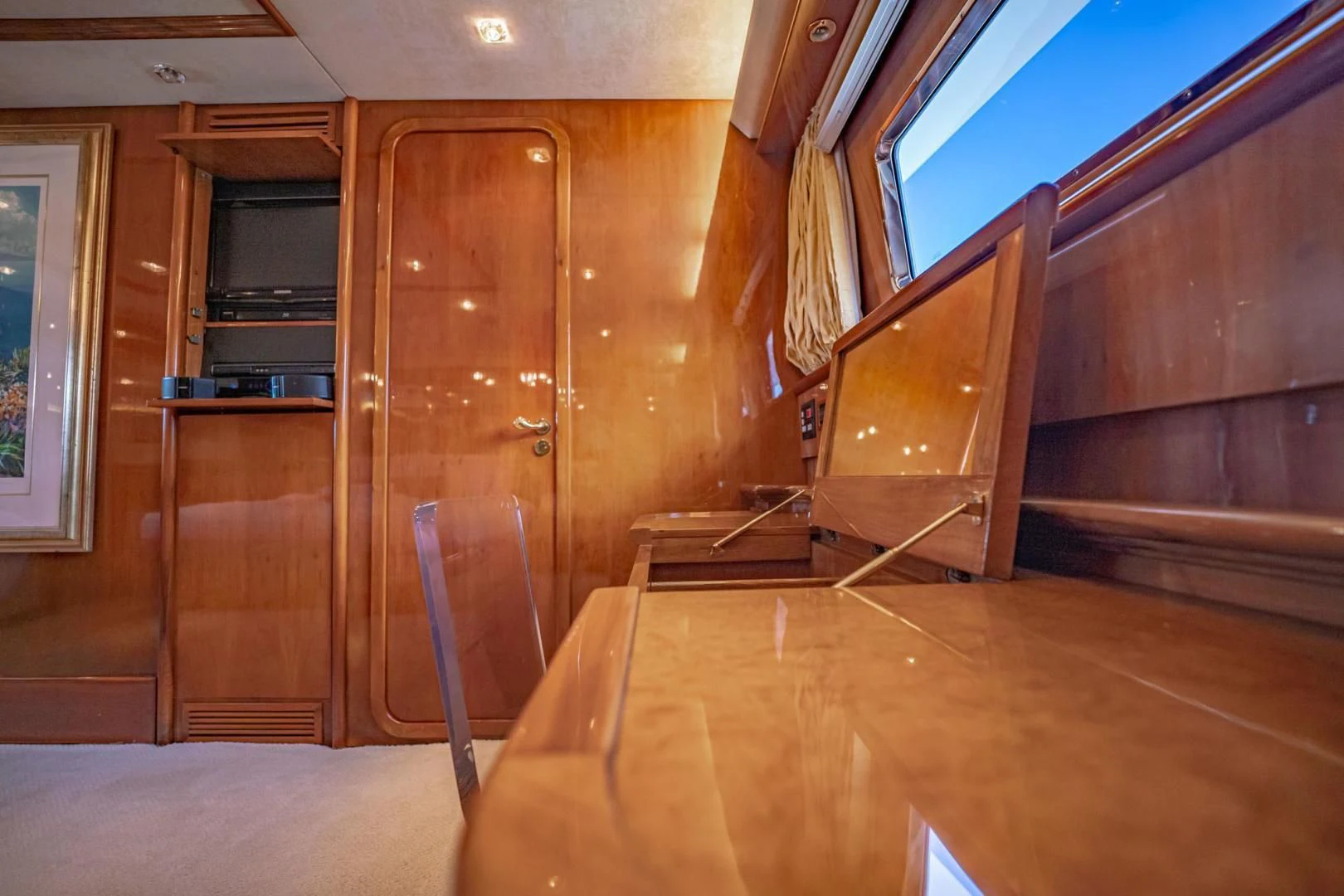 a room with wooden furniture aboard SHALIMAR Yacht for Sale