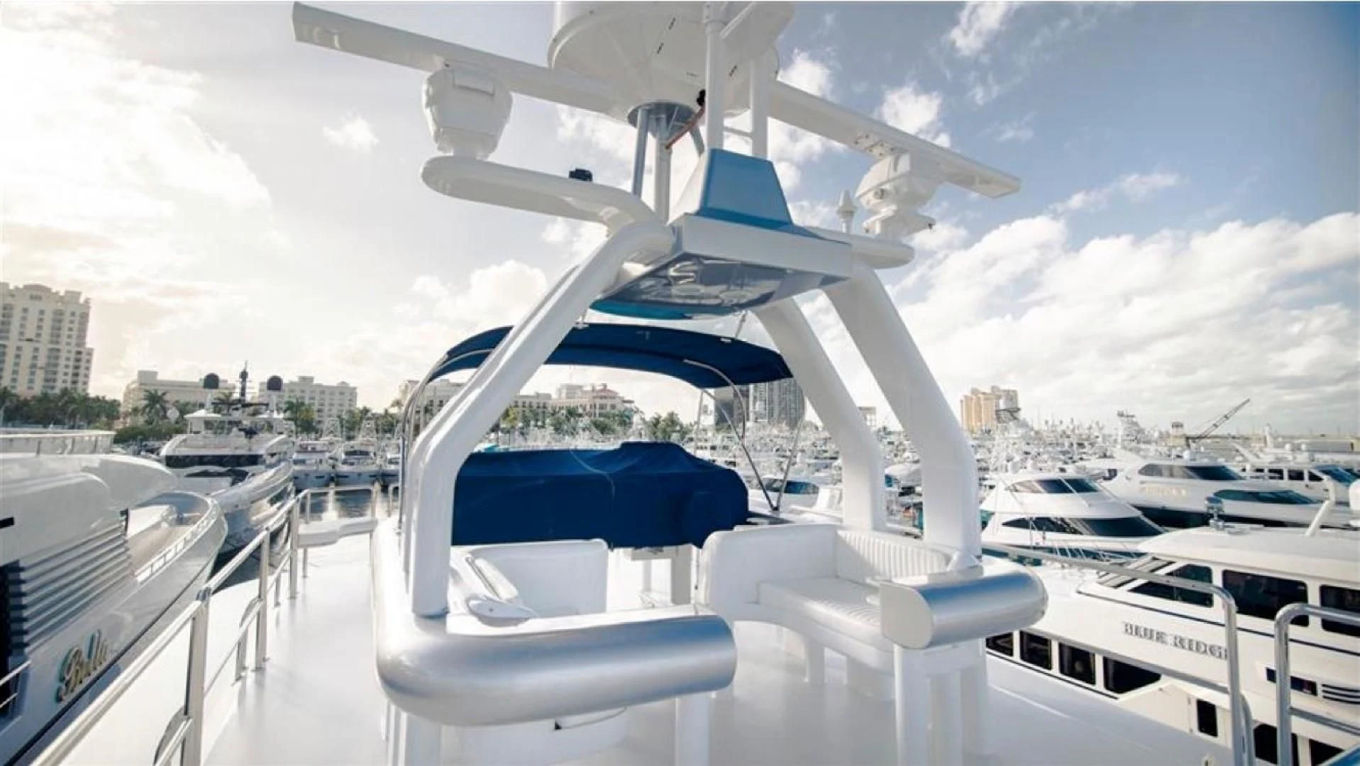 a white boat with a white canopy aboard SHALIMAR Yacht for Sale