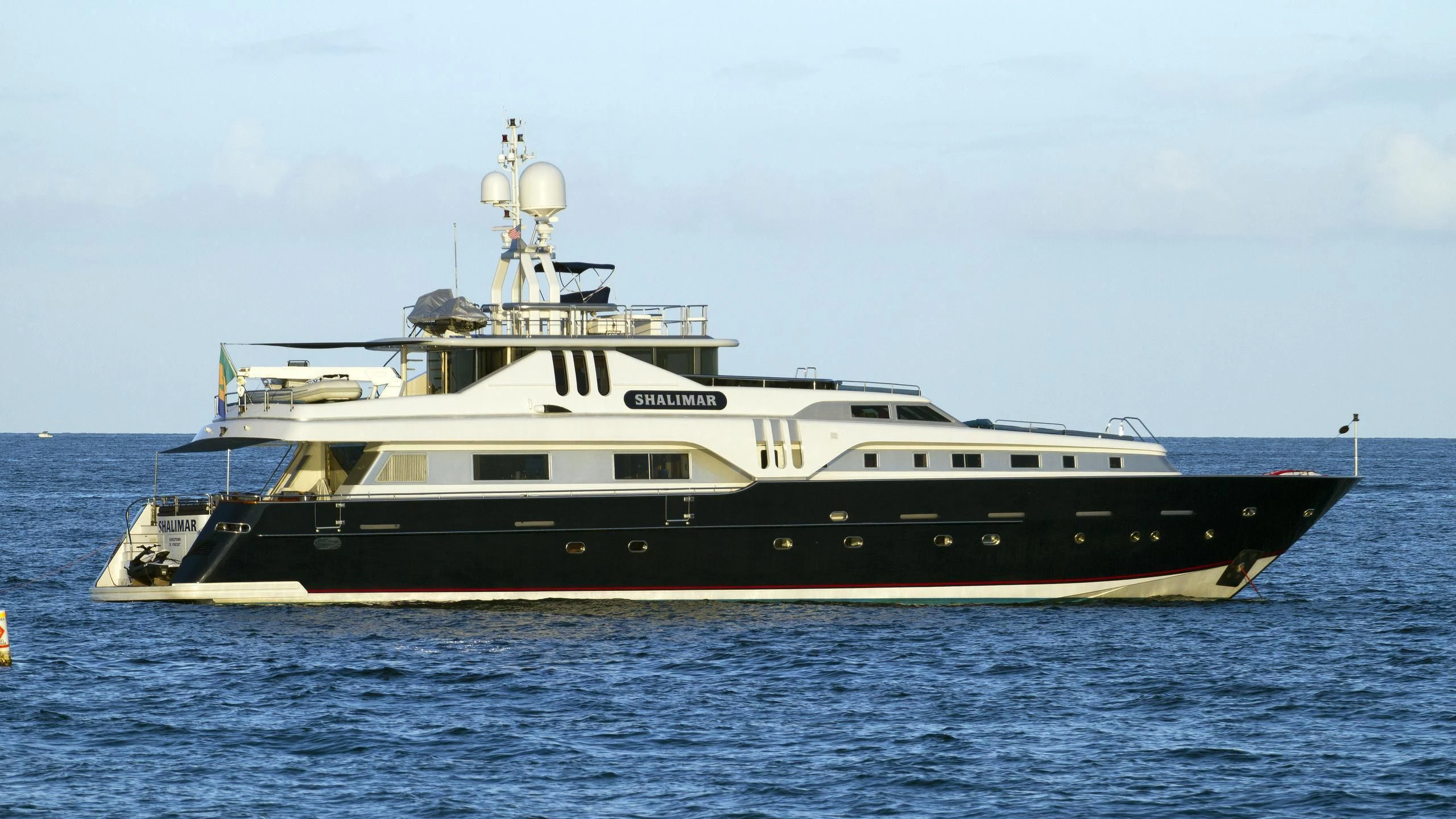a large ship in the water aboard SHALIMAR Yacht for Sale