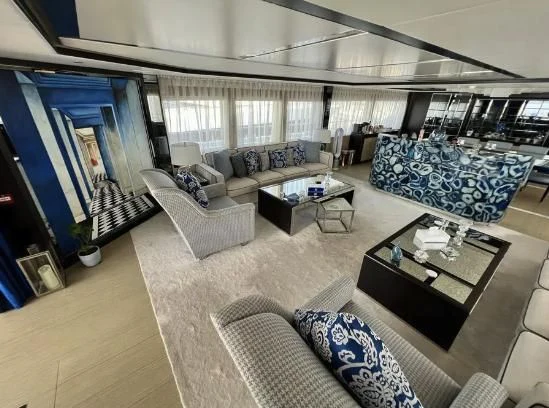 a living room with a large window aboard HAPPY DAYS 1 Yacht for Sale