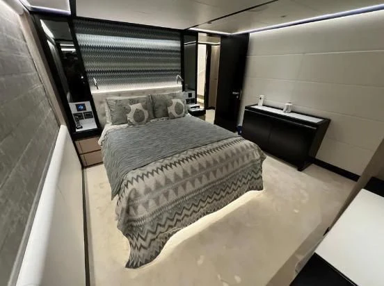 a bed in a room aboard HAPPY DAYS 1 Yacht for Sale