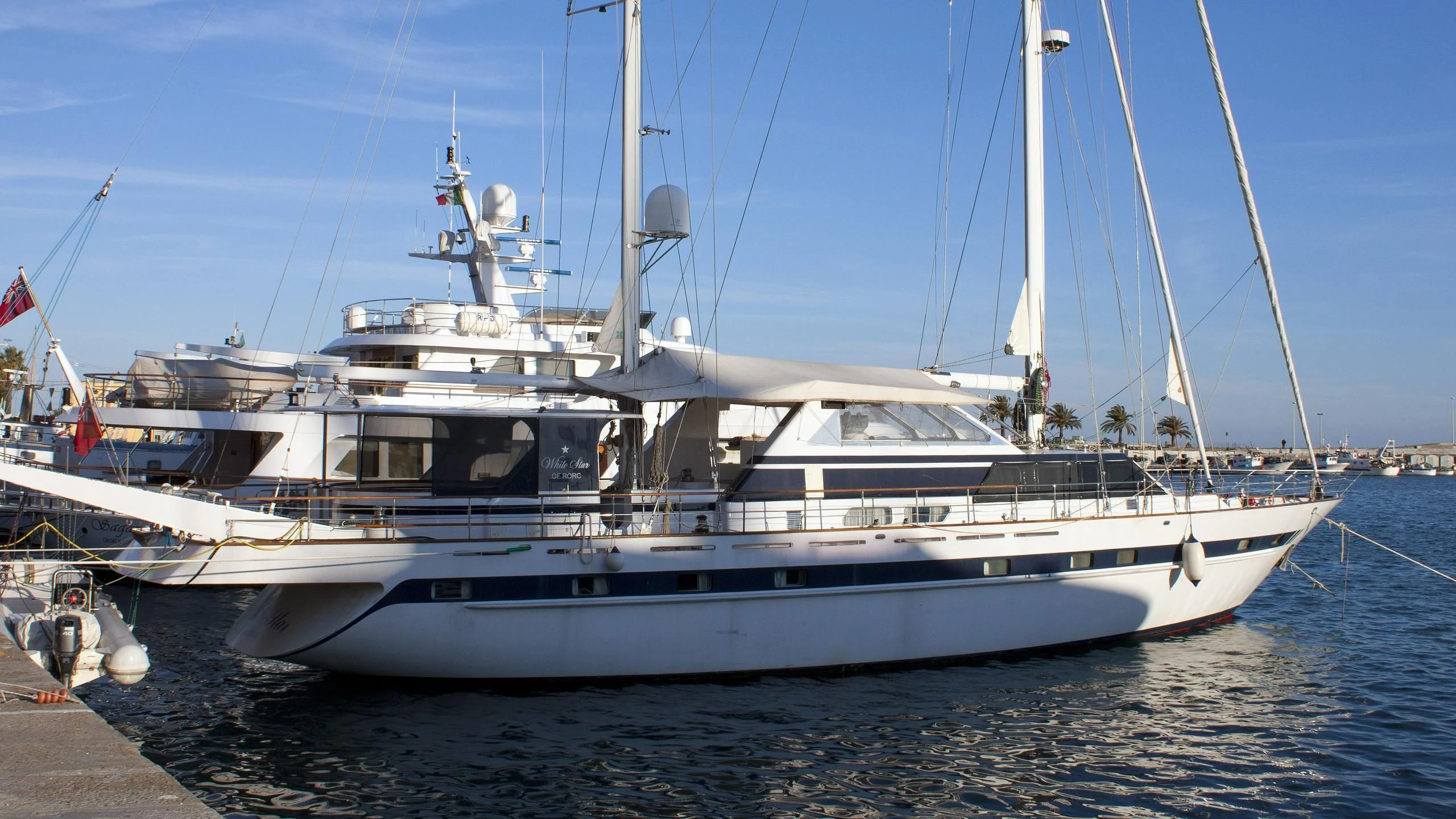 a white yacht on the water aboard WHITE STAR OF RORC Yacht for Sale
