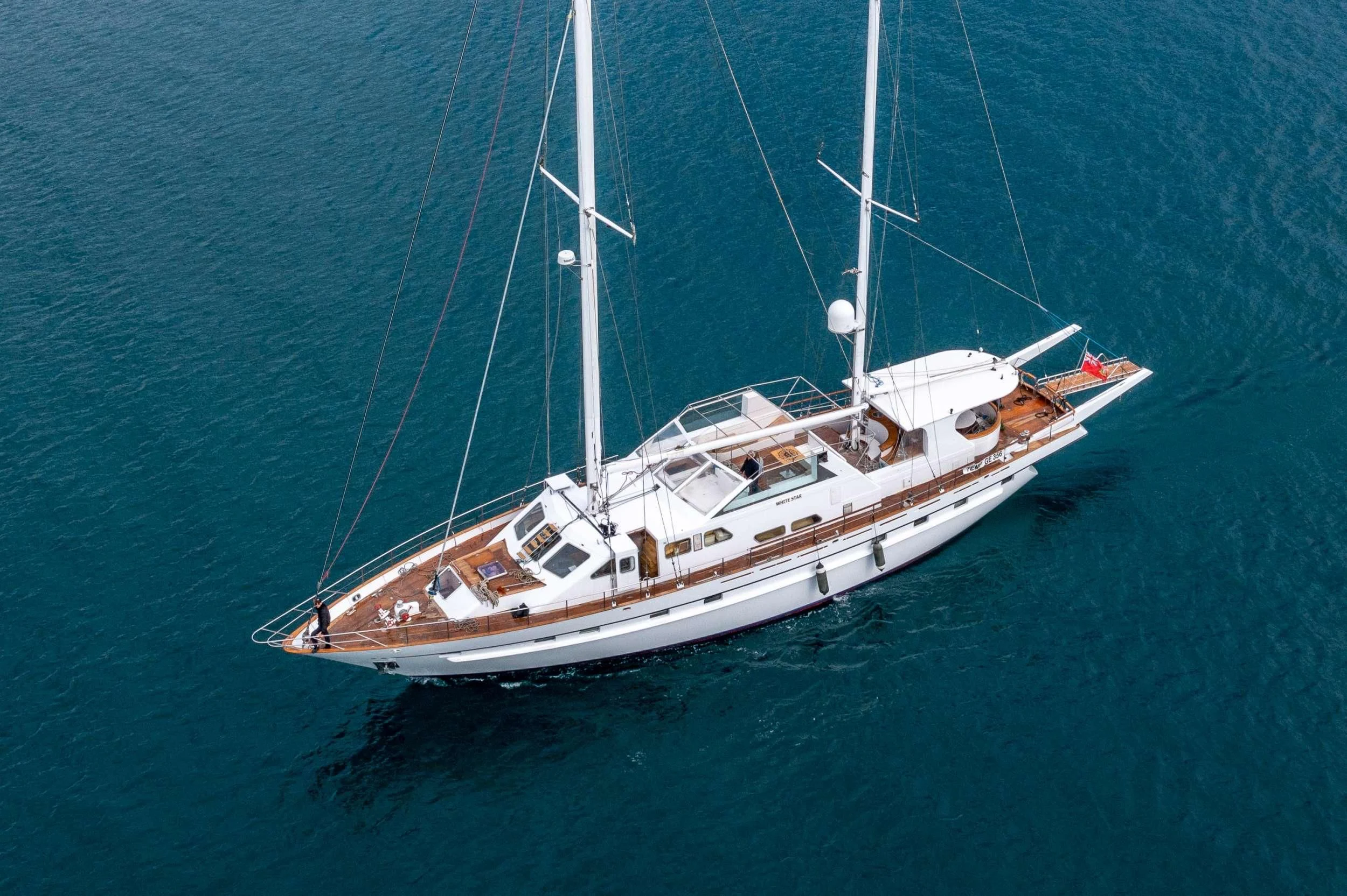 a white boat in the water aboard WHITE STAR OF RORC Yacht for Sale