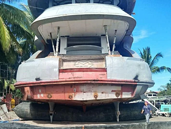a person walking next to a large tank aboard MY QUEEN 888 Yacht for Sale