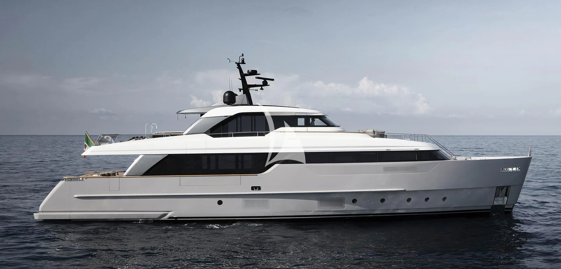 a white yacht on a beach aboard MALKIA Yacht for Sale