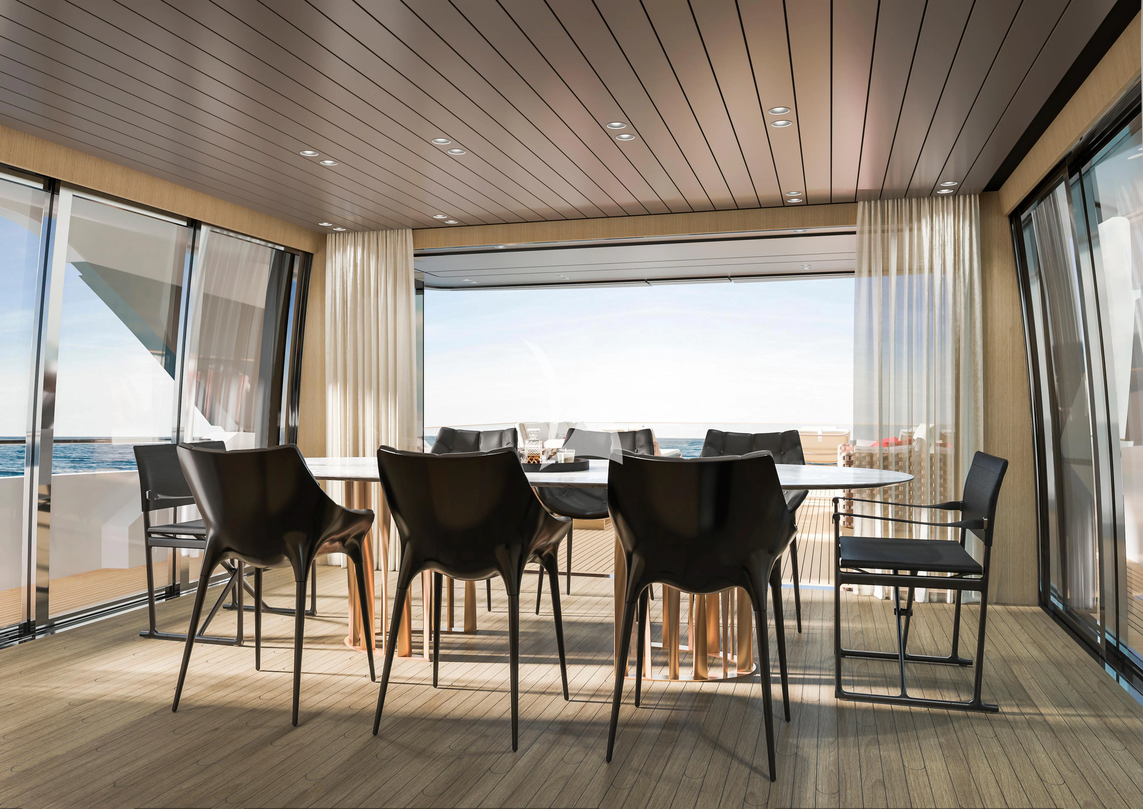 a room with a table and chairs aboard MALKIA Yacht for Sale