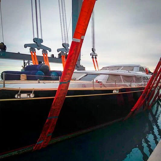 a red and white boat aboard PAZ Yacht for Sale