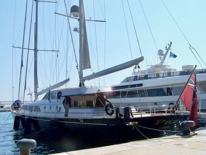 a couple of boats are parked in the water aboard PAZ Yacht for Sale