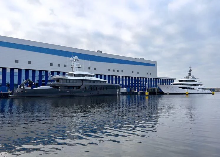 a couple of boats in a harbor aboard JUICE Yacht for Sale