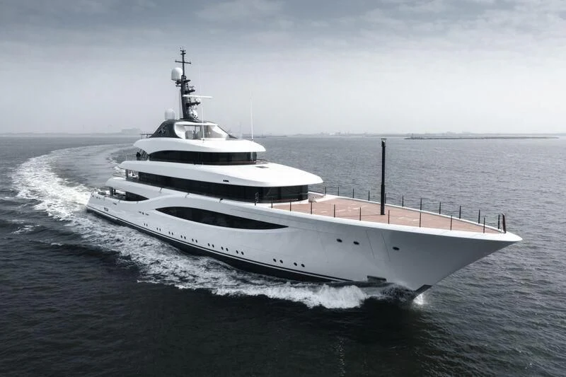 a white boat on the water aboard JUICE Yacht for Sale