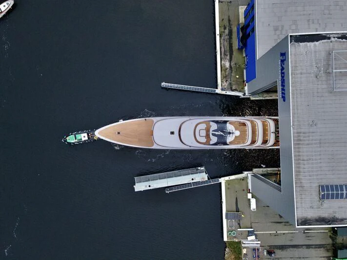 a skateboard is parked on the side of a building aboard JUICE Yacht for Sale
