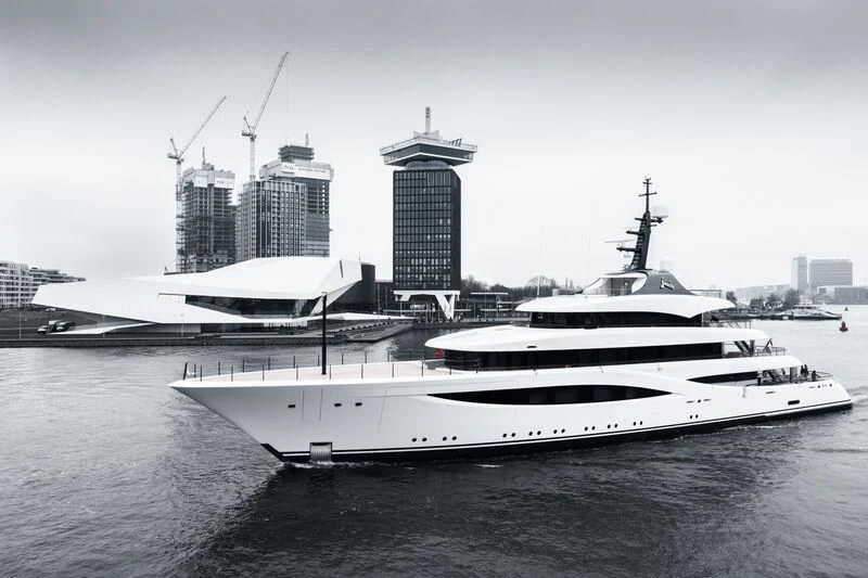 a large white boat in the water aboard JUICE Yacht for Sale