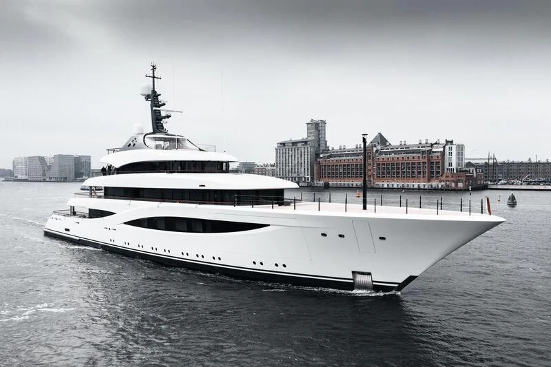 a large white boat in the water aboard JUICE Yacht for Sale