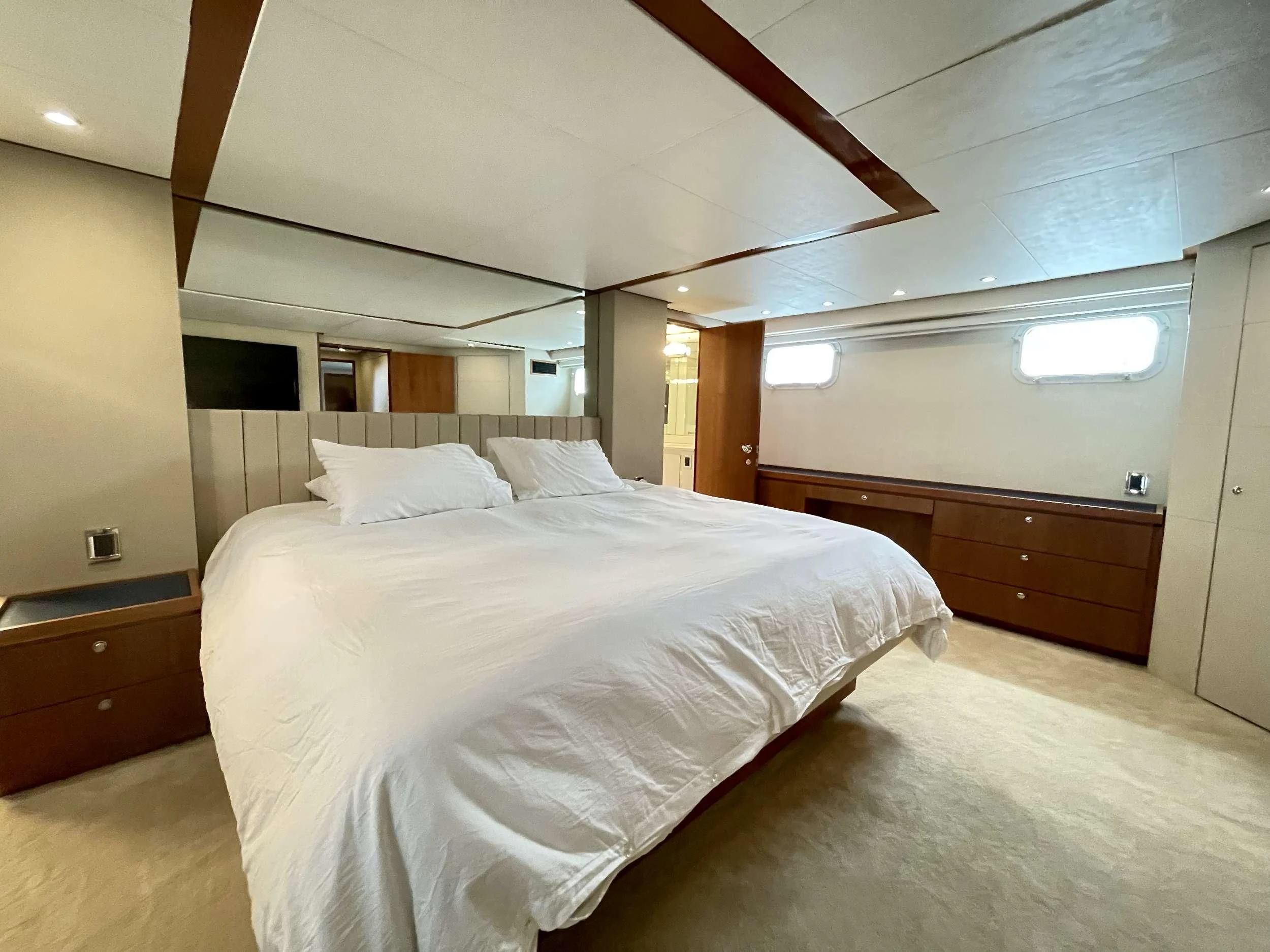 a bedroom with a large bed aboard DESLIZE Yacht for Sale