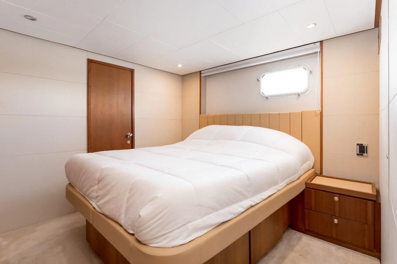 a bed in a room aboard DESLIZE Yacht for Sale