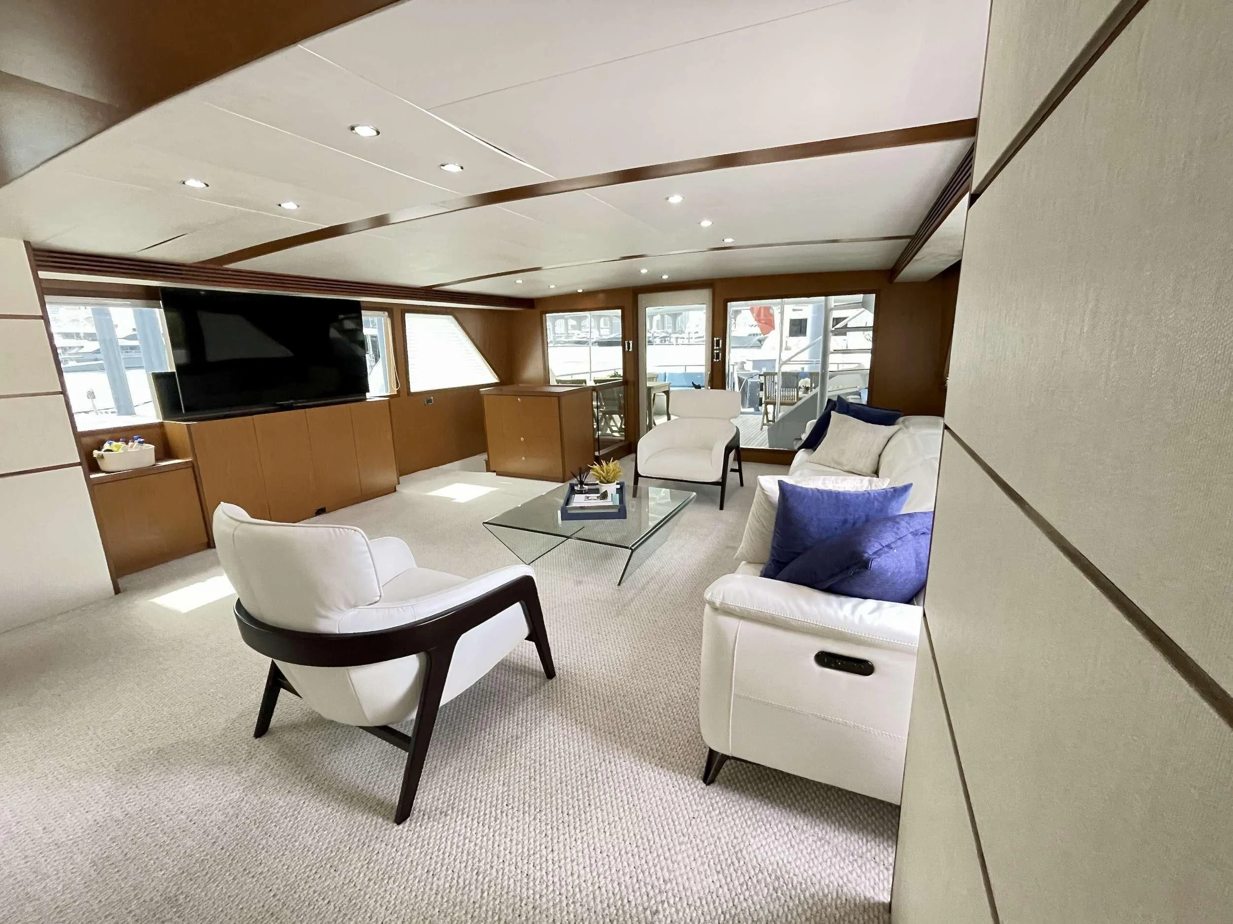 a room with a couch and a table aboard DESLIZE Yacht for Sale