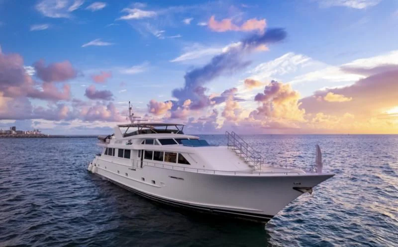 a white yacht on the water aboard DESLIZE Yacht for Sale