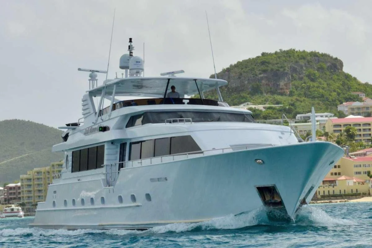 a white yacht in the water aboard DESLIZE Yacht for Sale