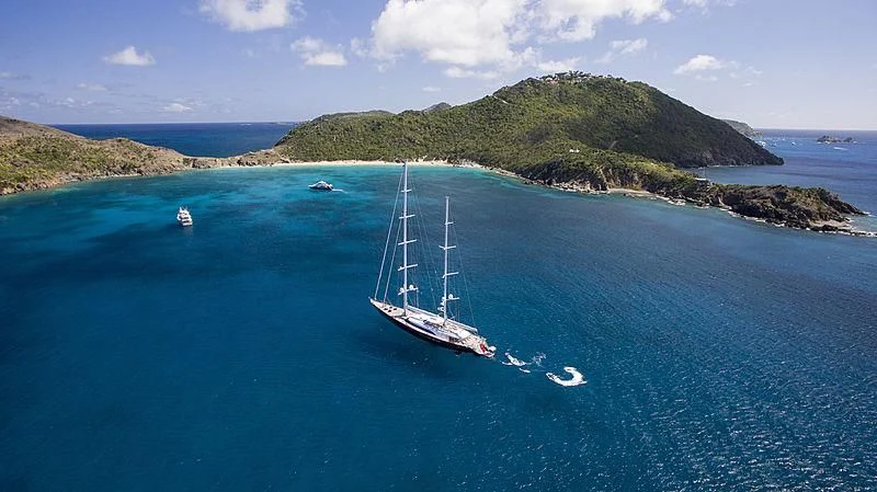 a boat sailing in the sea aboard PANTHALASSA Yacht for Sale