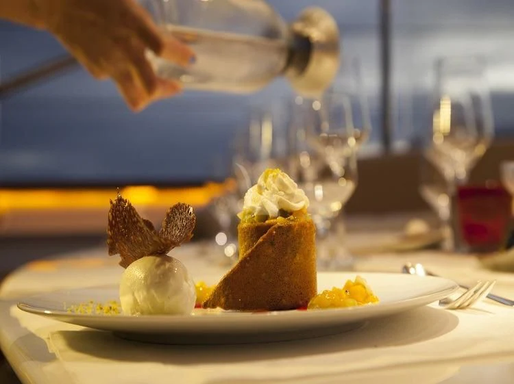 a plate of dessert aboard PANTHALASSA Yacht for Sale
