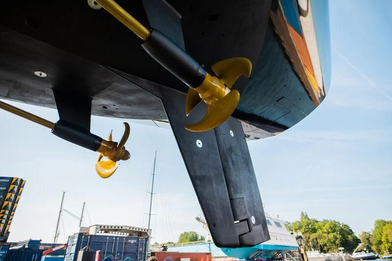 a statue of a person on a swing set aboard PANTHALASSA Yacht for Sale