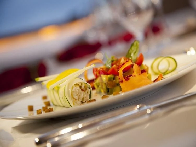 a plate of sushi aboard PANTHALASSA Yacht for Sale