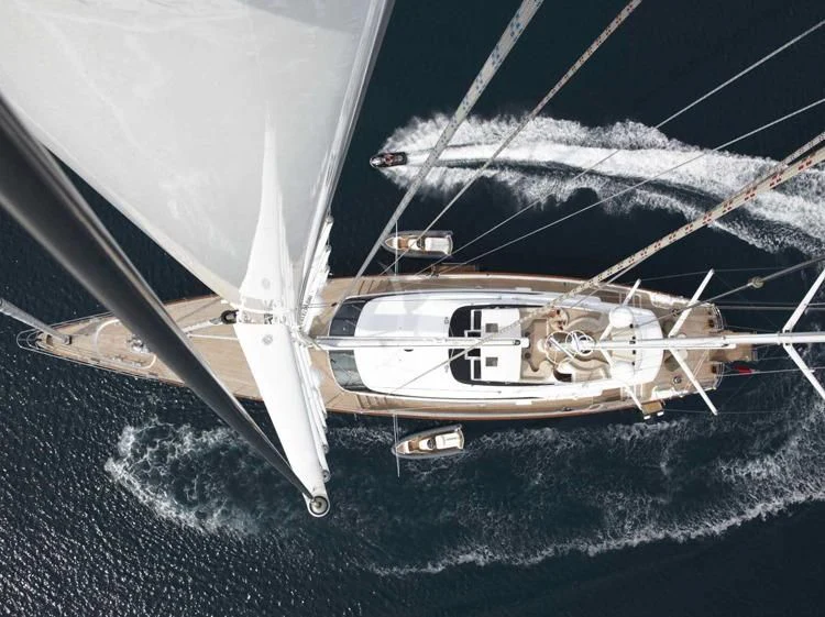 a white boat on the water aboard PANTHALASSA Yacht for Sale