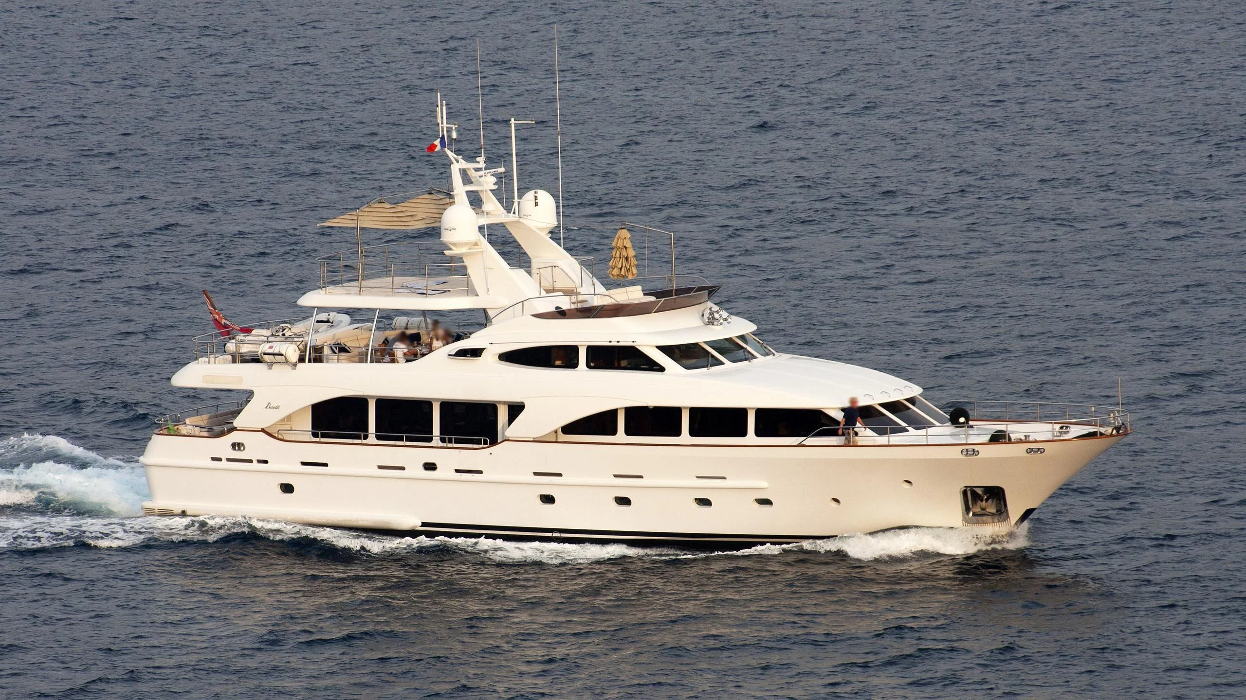 a white boat on the water aboard BENETTI TRADITION 100 Yacht for Sale