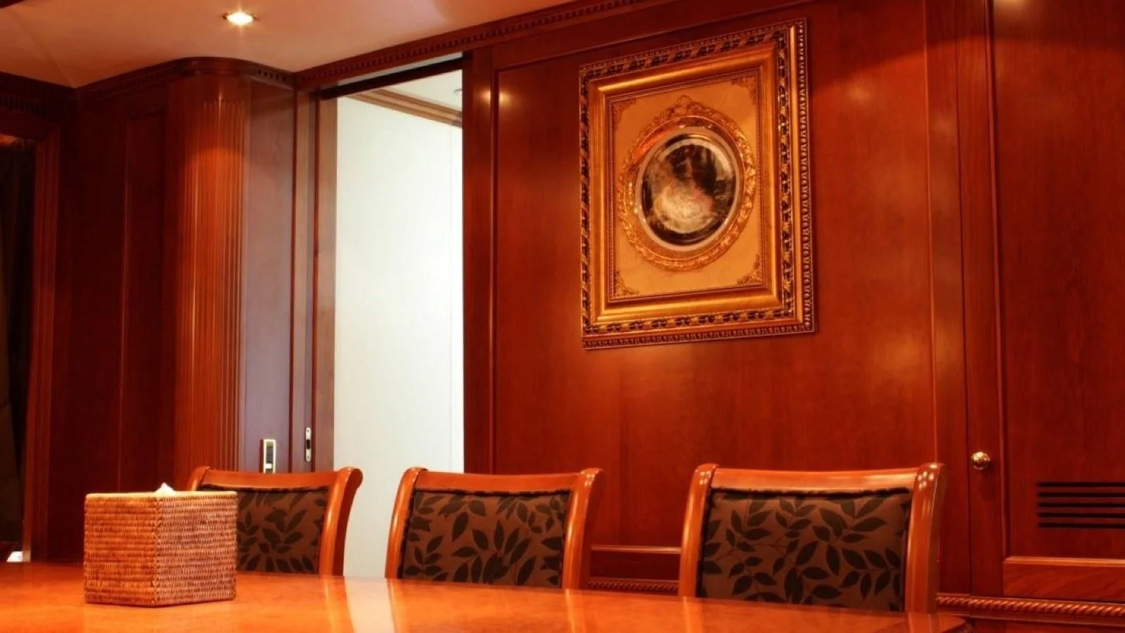 a room with a table and chairs aboard BENETTI TRADITION 100 Yacht for Sale