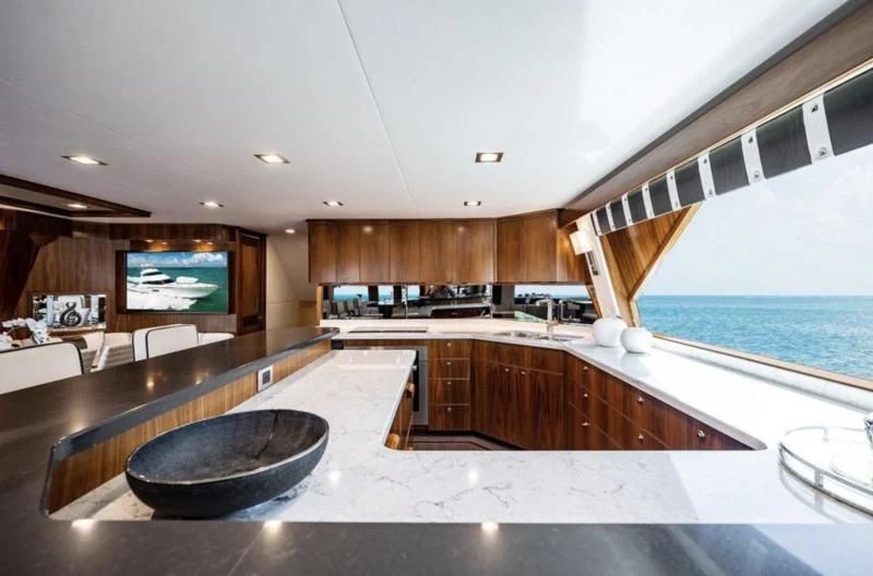 a large kitchen with a large island aboard 17 Yacht for Sale