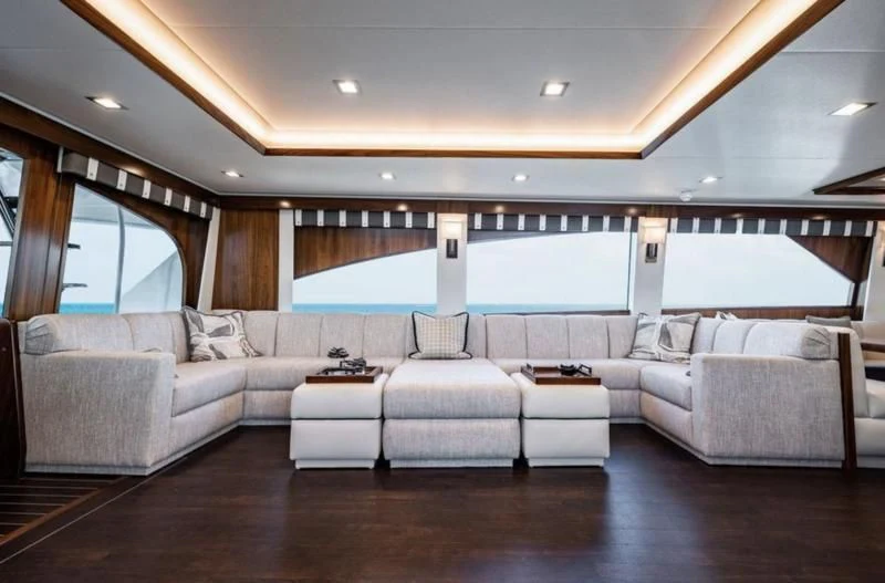 a large living room with a large window aboard 17 Yacht for Sale