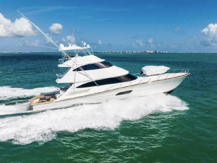 a white boat in the water aboard 17 Yacht for Sale