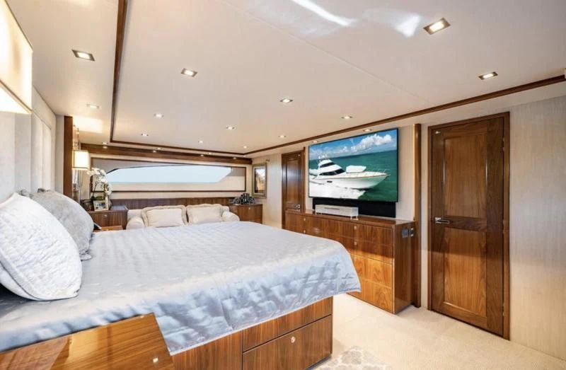 a bedroom with a large bed aboard 17 Yacht for Sale