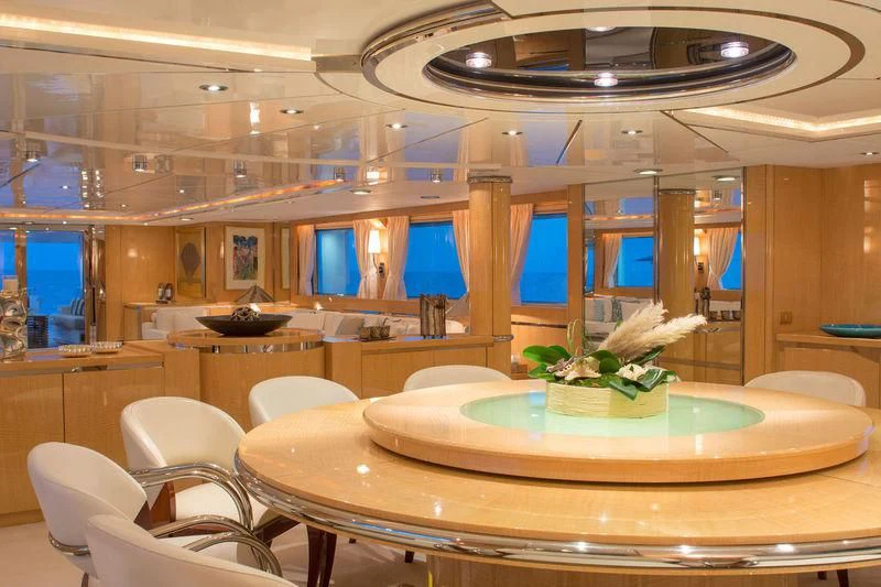 a room with a table and chairs aboard O'NATALINA Yacht for Sale