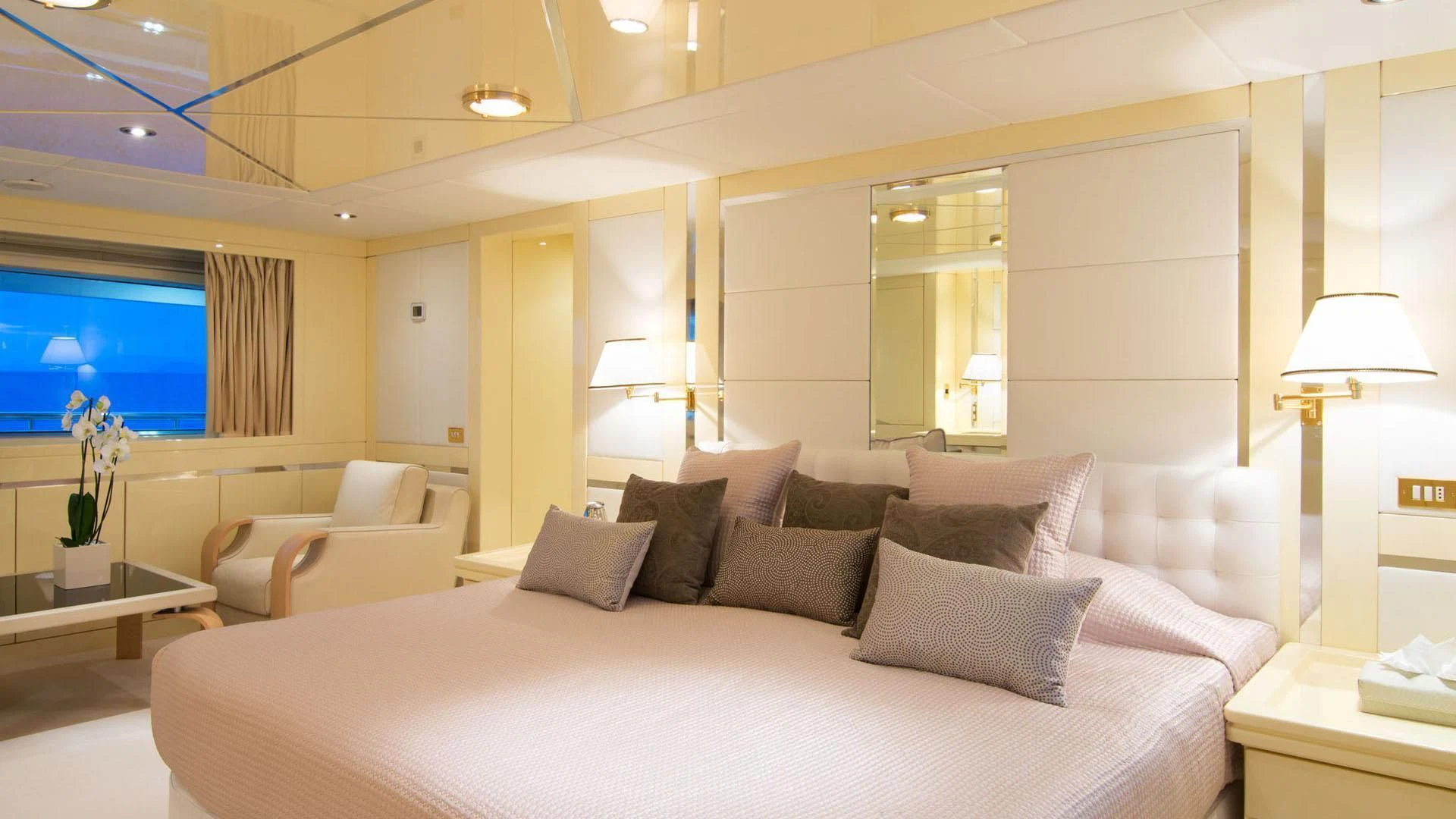 a large bed in a hotel room aboard O'NATALINA Yacht for Sale