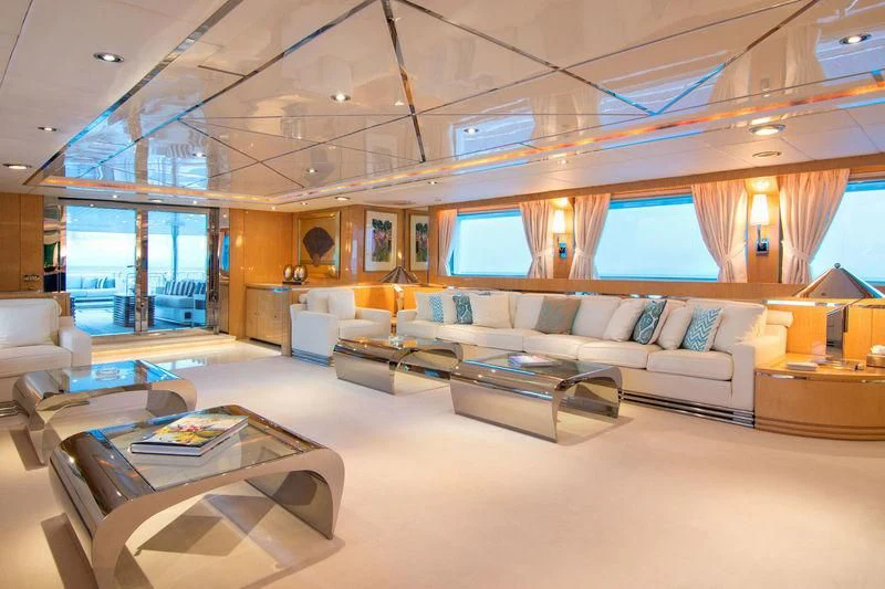 a large living room with a large window aboard O'NATALINA Yacht for Sale