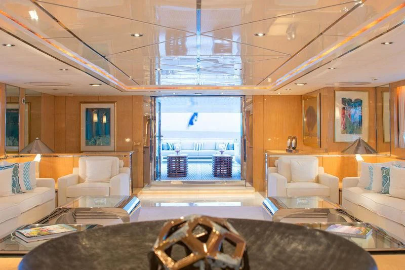 a living room with a large window aboard O'NATALINA Yacht for Sale