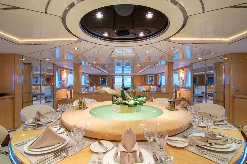 a table with plates and glasses aboard O'NATALINA Yacht for Sale