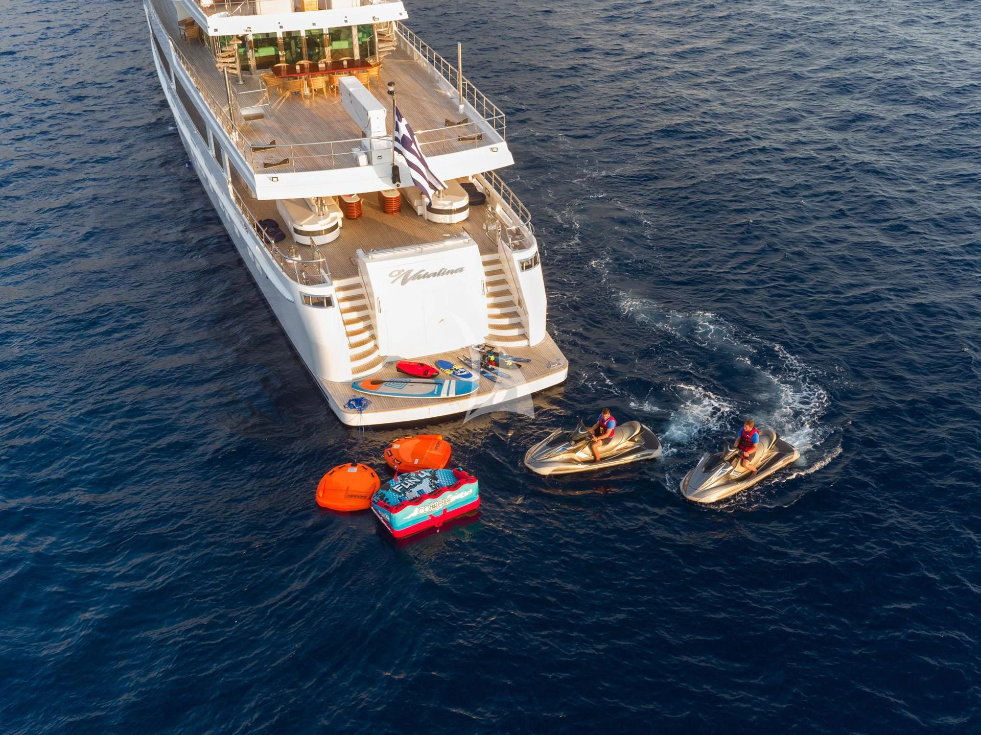 a boat with a person in it aboard O'NATALINA Yacht for Sale