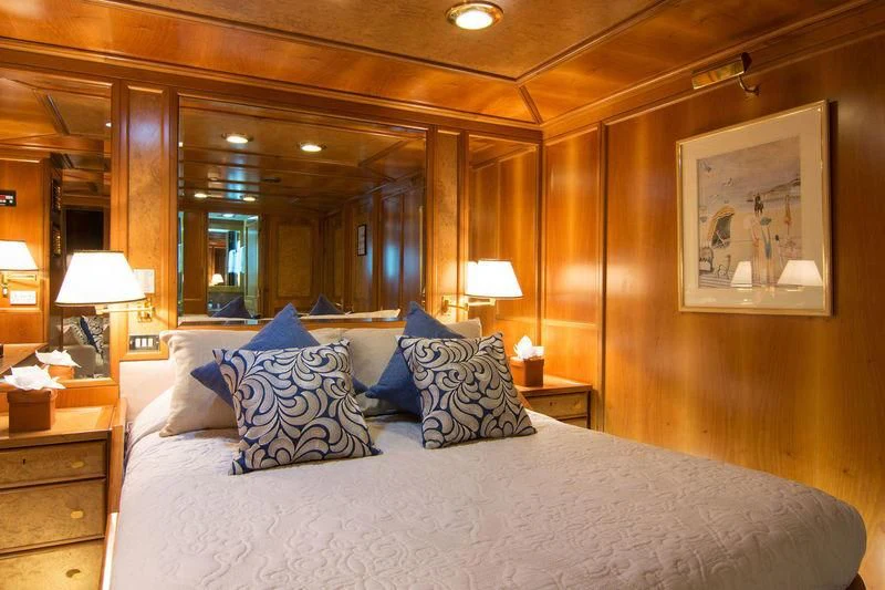 a bed with pillows aboard O'NATALINA Yacht for Sale