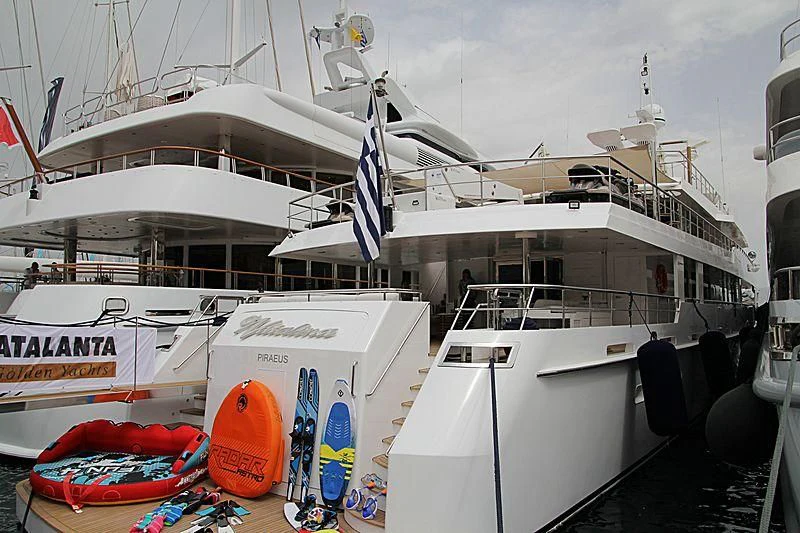 a boat docked with boats aboard O'NATALINA Yacht for Sale
