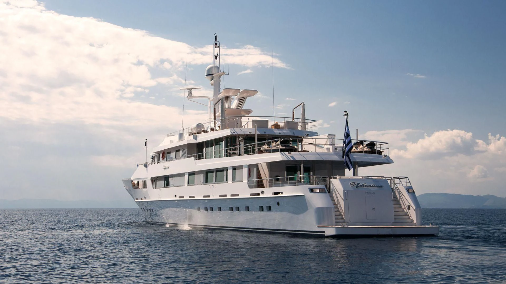 a large white boat in the water aboard O'NATALINA Yacht for Sale