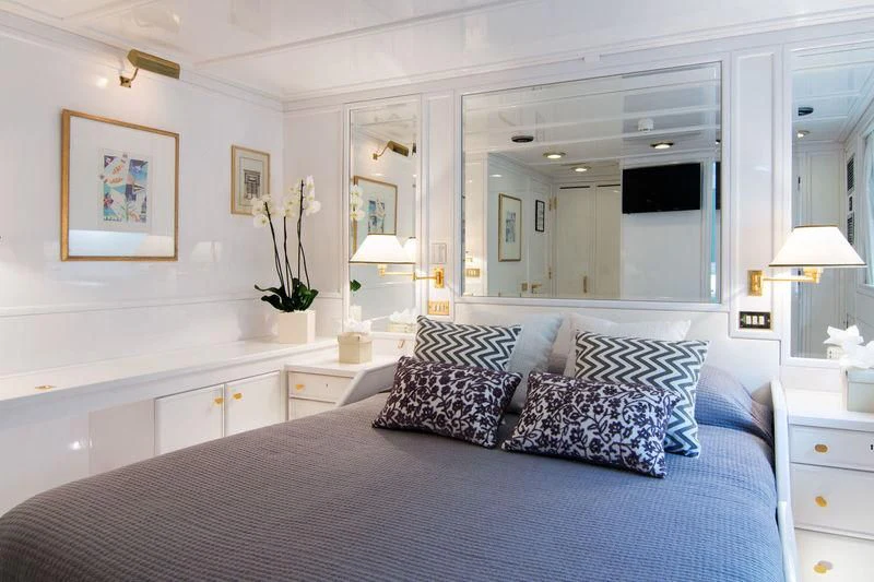 a large bed with pillows aboard O'NATALINA Yacht for Sale